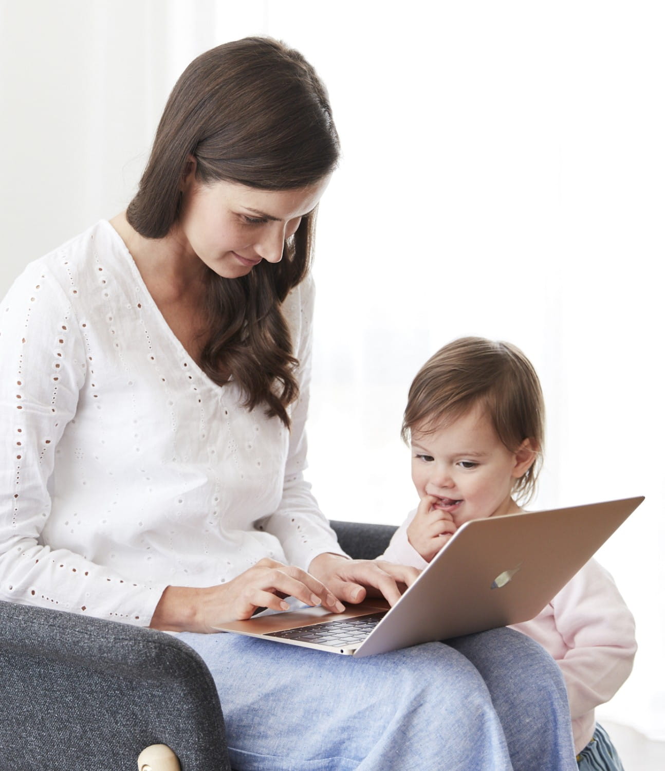 Woman and child on laptop computer