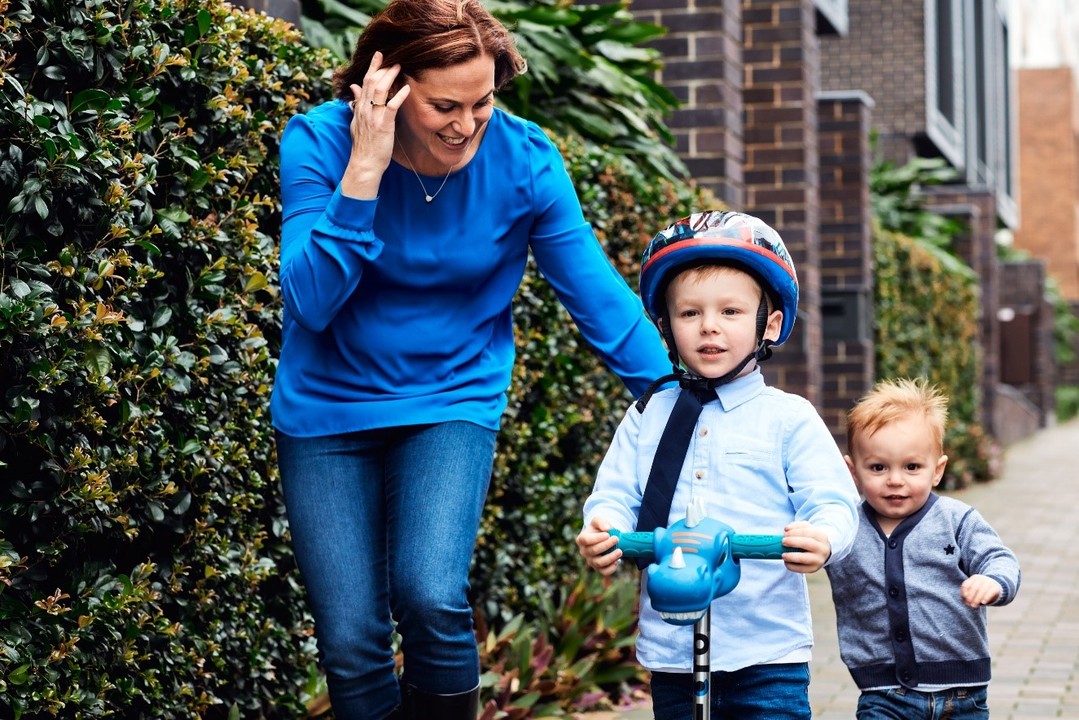 Women playing with children