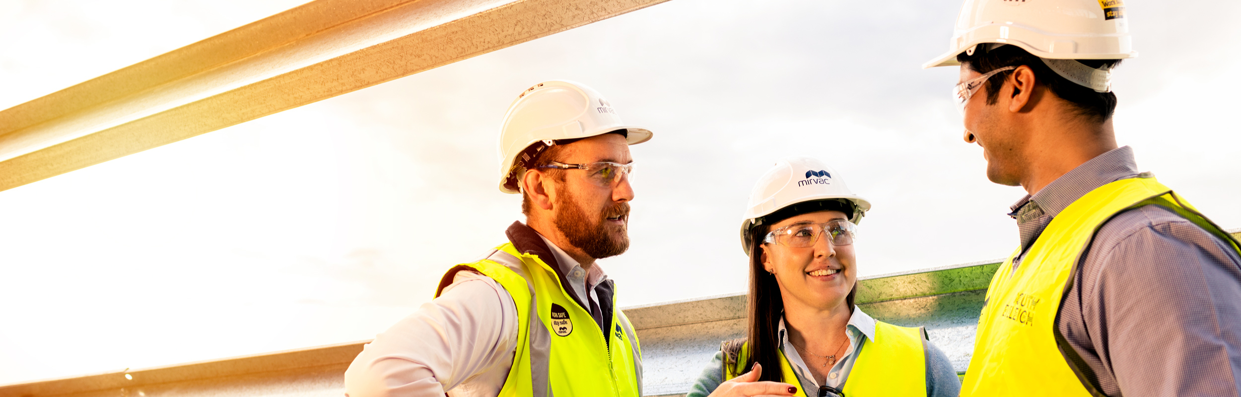 Mirvac team talking on construction site