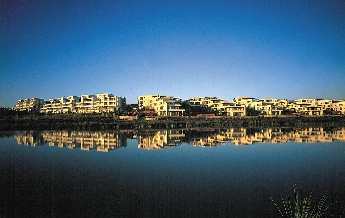 Newington by Mirvac view of homes across lake