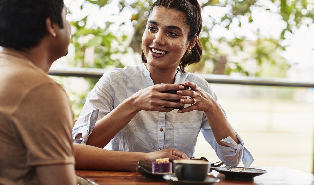 Woman having coffee photo