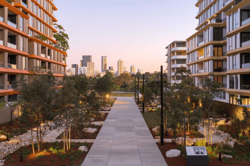 A panoramic view of the NINE by Mirvac Plaza showing open public space and landscaped gardens.